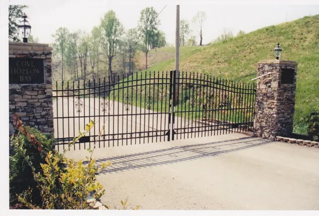 Gated community entrance with stone columns - Elantra Gate Systems